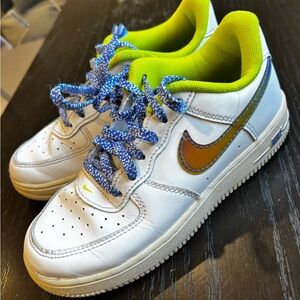 Nike White Sneakers with Blue and Yellow Accents